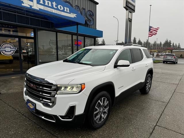 2023 GMC Acadia SLT in Summit White — front three-quarter view