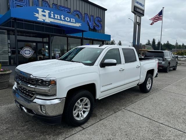 2017 Chevrolet Silverado 1500 LTZ in Summit White — front three-quarter view