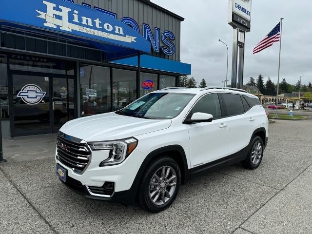 2024 GMC Terrain SLT in Summit White — front three-quarter view