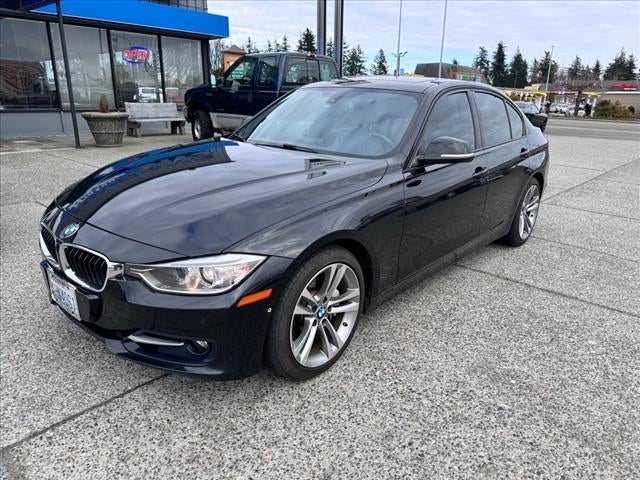 2012 BMW 3 Series 335i in Black — front three-quarter view